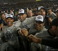 The NY Yankees including Mariano Rivera, Derek Jeter, Ramiro Pena and Andy Pettitte celebrate winning the World Series.  Bronx, NY