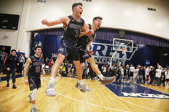 Moravian celebrates winning the men's basketball Landmark Conference Championship.