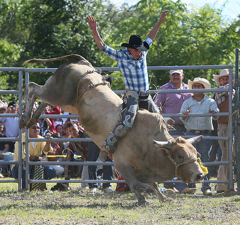 This rider is Chonta rode this bull and was not thrown off.