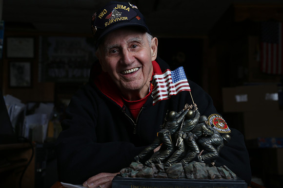 Survivor of the Battle of Iwo Jima, Eugene Iaconetti with some of his decorations from his years as a US Marine.
