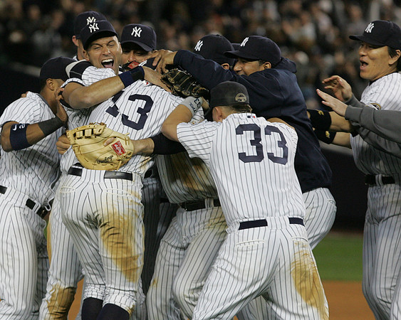 The team celebrates winning the American League pennant with a 5-2 win over the Angles in Game 6.